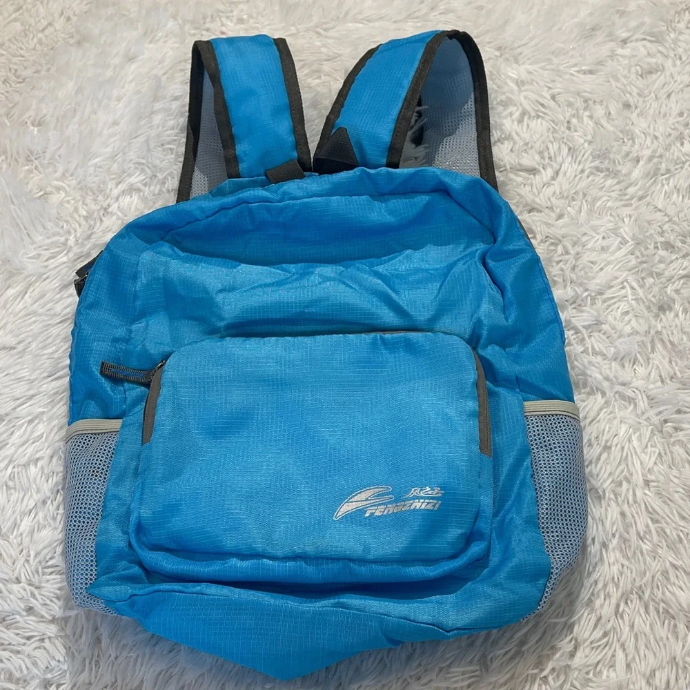 Blue Backpack With phone charger NWOT unisex